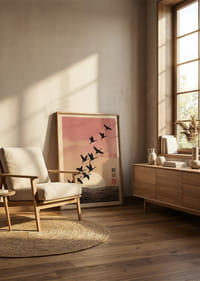 Birds fly towards the sunrise in soft pink tones.-2