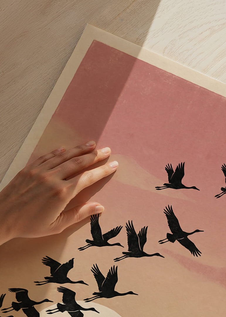 Birds fly towards the sunrise in soft pink tones.-12