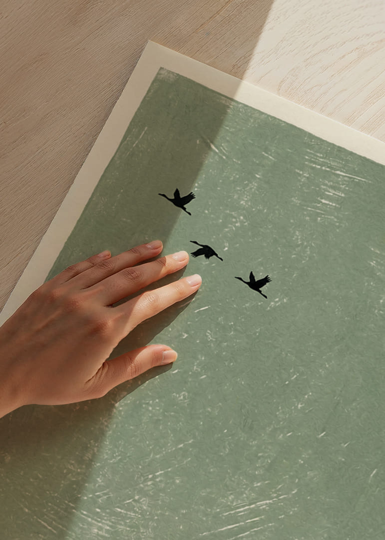 Three birds fly silently across a clean, green sky.-12