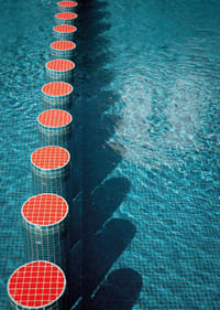 Red and blue tones create rhythmic symmetry in the water.-7