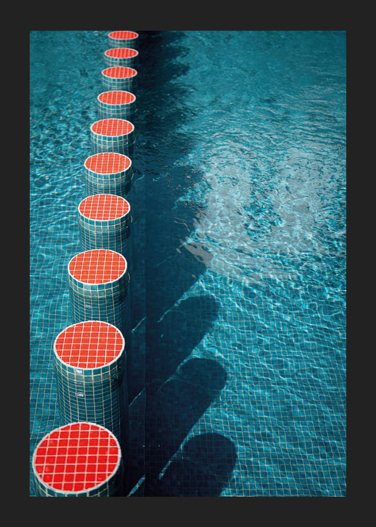 Red and blue tones create rhythmic symmetry in the water.-12