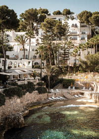 Charming Mediterranean architecture on the coast during sunset.-7