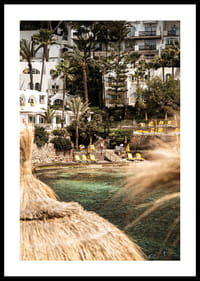 Sunlit coastal houses create a tropical dream escape.-0