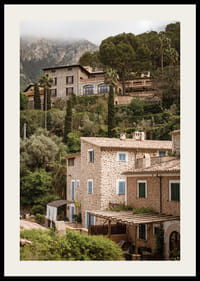 Charming village with stone houses surrounded by lush greenery.-2