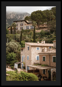 Charming village with stone houses surrounded by lush greenery.-4