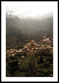 A village nestled in the silent embrace of the misty mountains.-0