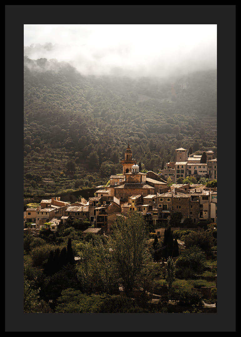 A village nestled in the silent embrace of the misty mountains.-12