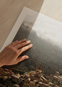 A village nestled in the silent embrace of the misty mountains.-9