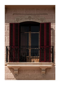 An elegant balcony with rustic red shutters.-1