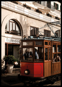 Charming tram in the golden glow of the evening sun.-6