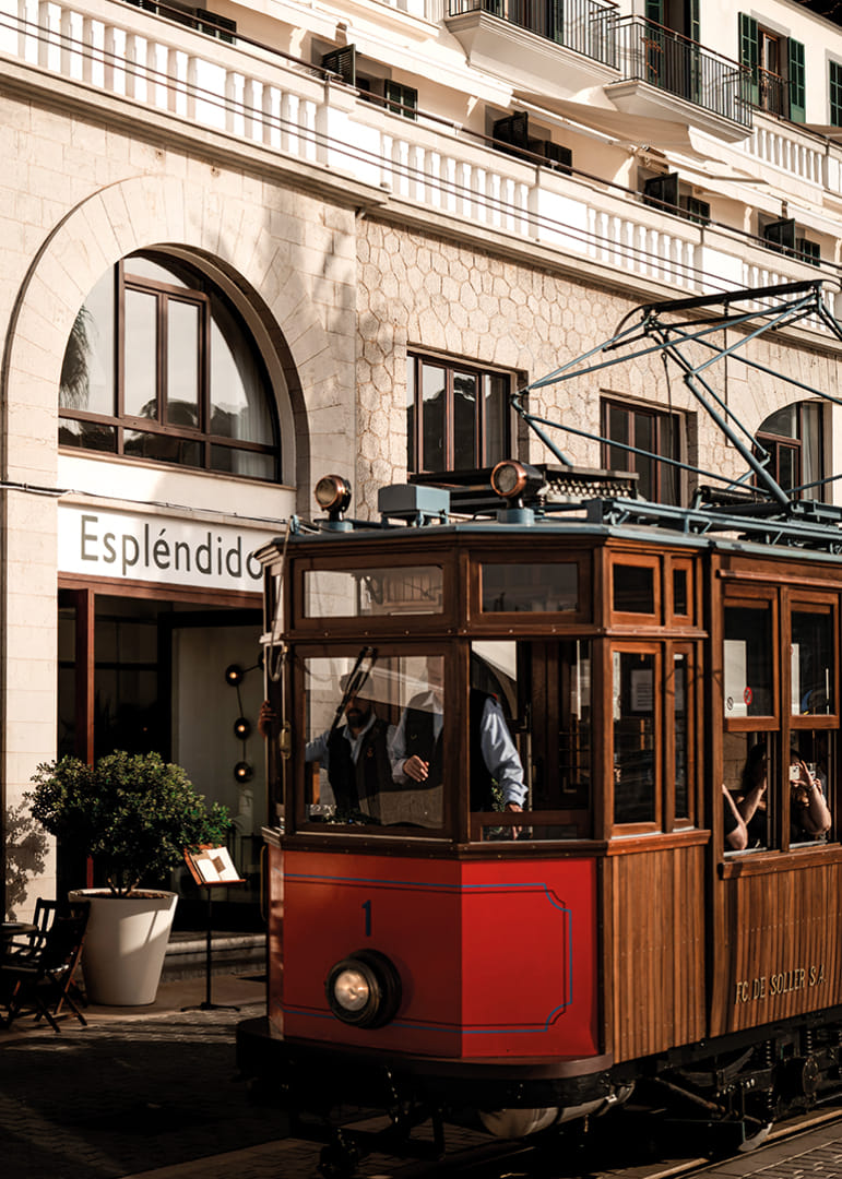 Charming tram in the golden glow of the evening sun.-12