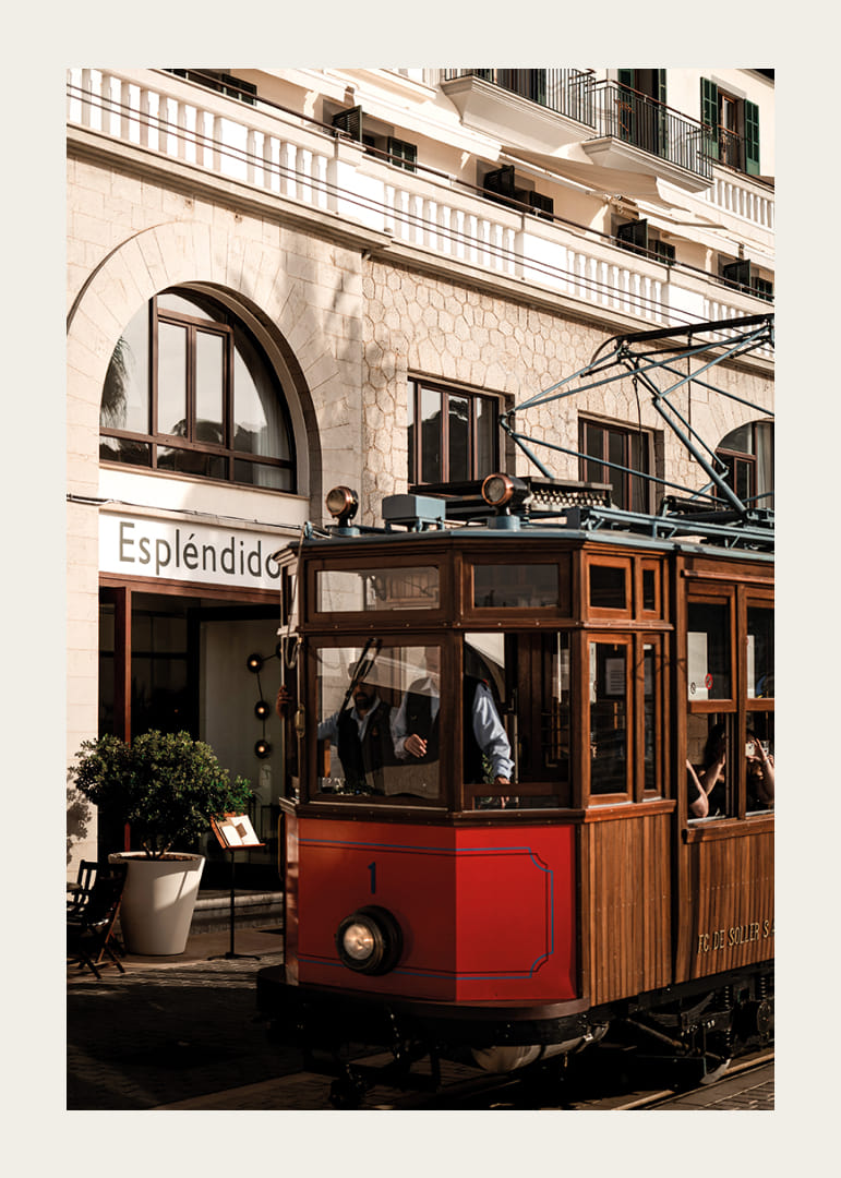 Charming tram in the golden glow of the evening sun.-12