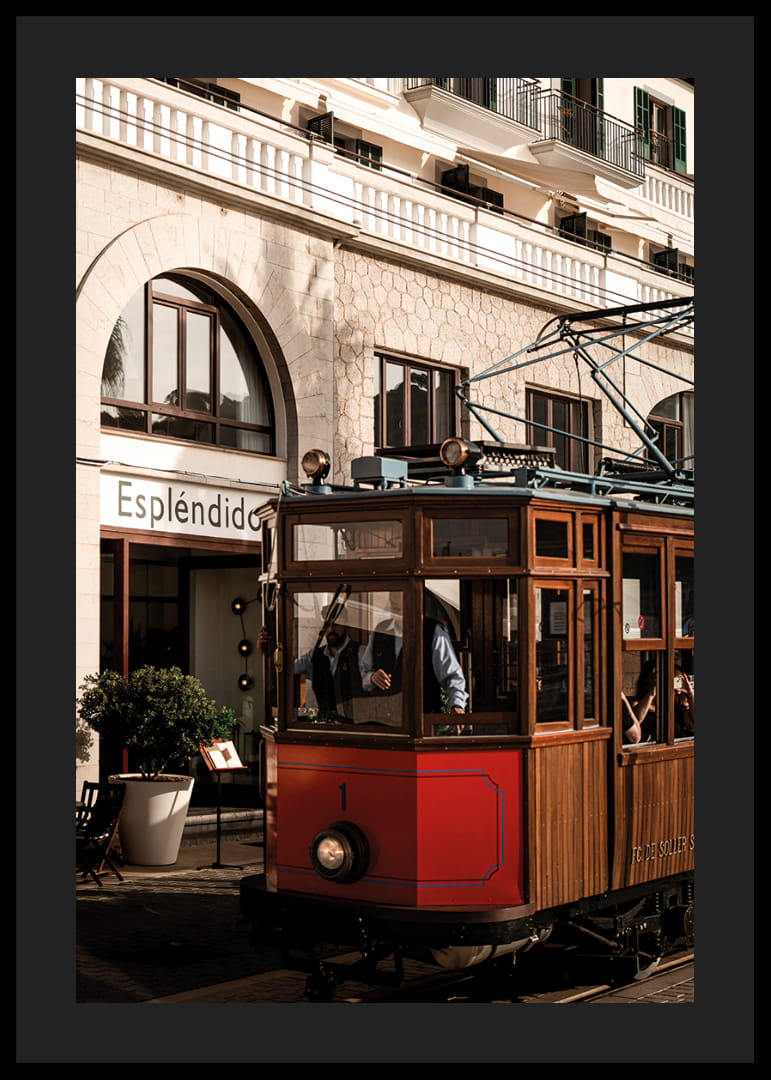 Charming tram in the golden glow of the evening sun.-12
