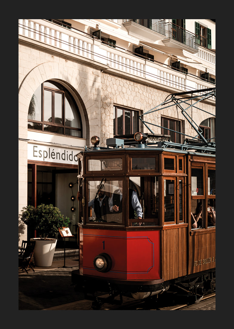 Charming tram in the golden glow of the evening sun.-12