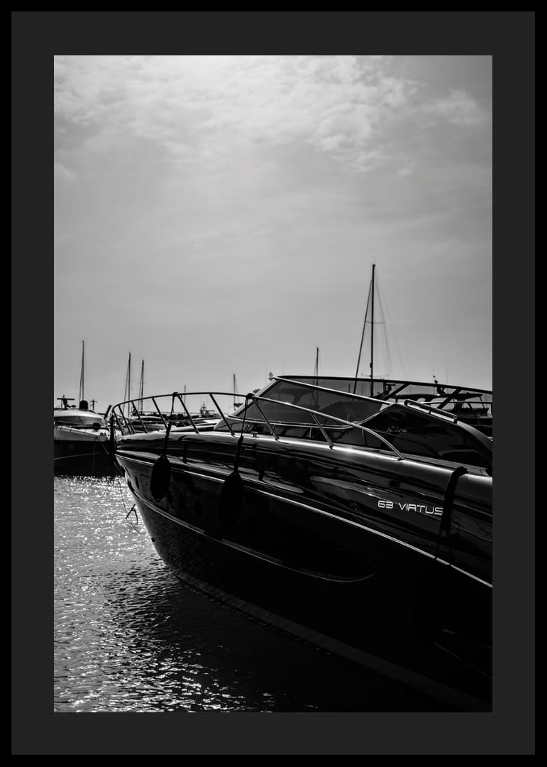Silhouettes of boats in a calm water landscape.-12