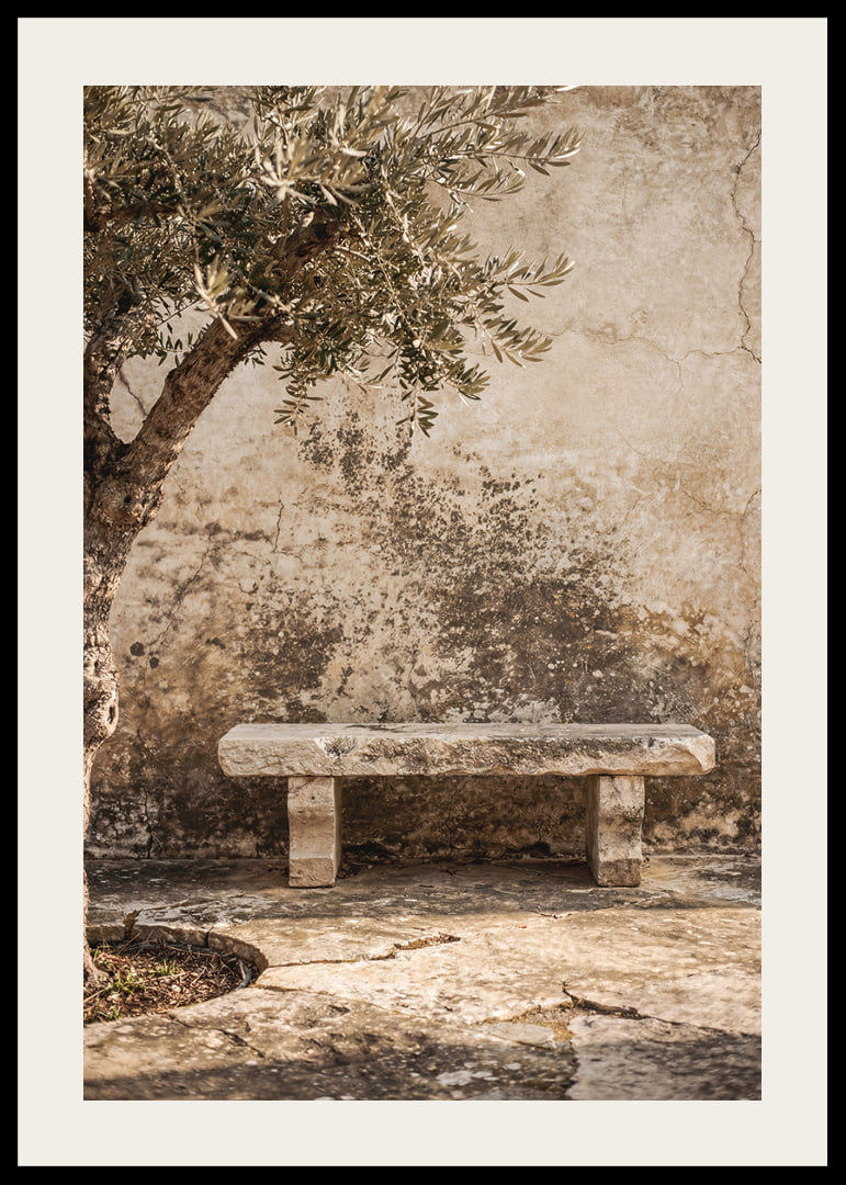 A timeless stone bench against an antique wall creates peaceful harmony.-12