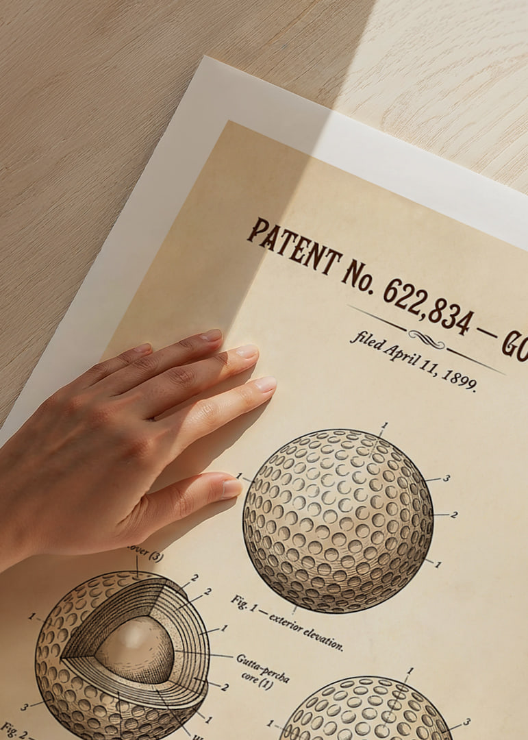 Patented golf ball from 1899 with detailed design.-12