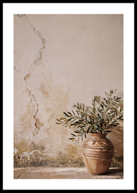 A beautiful composition of a rustic pot against a patinated wall.-0