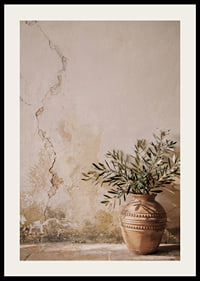 A beautiful composition of a rustic pot against a patinated wall.-2