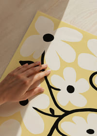 Playful white flowers on a light yellow background spread joy.-3