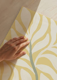Soft leaves against a sunny yellow background spread tranquility.-3