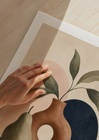 Stylish shapes meet in a peaceful composition of pear and pot.-9