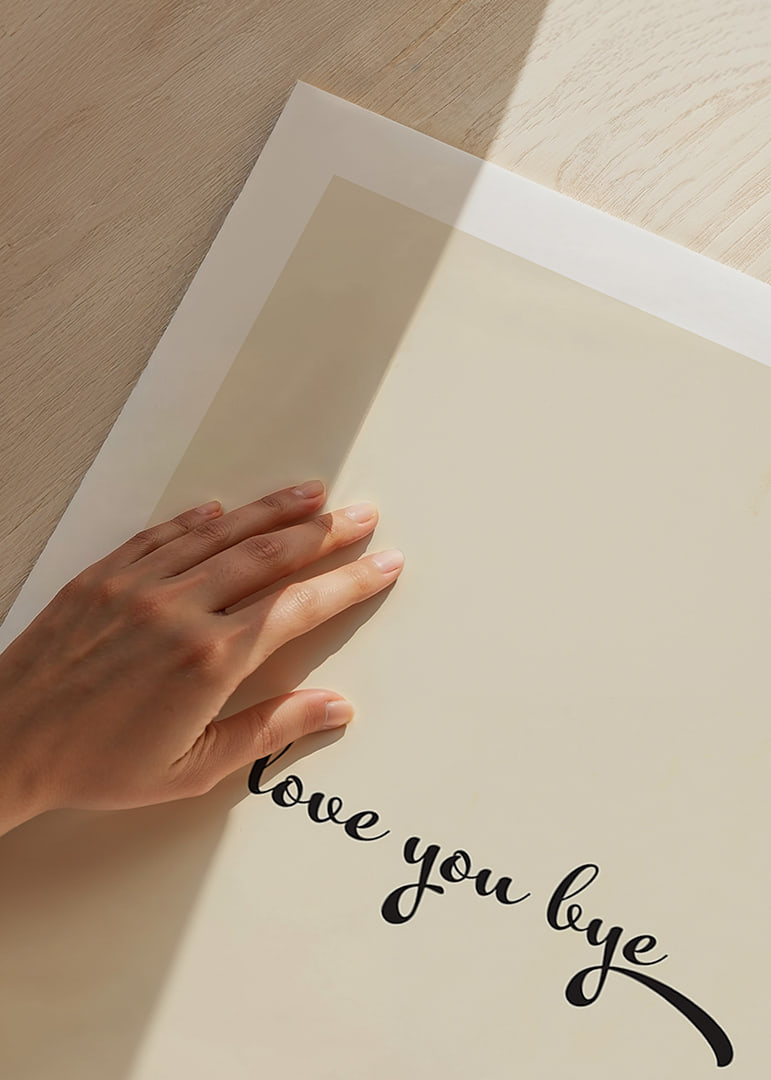 Playful handwritten love greeting in black against a warm beige background.-12