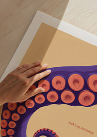 A purple octopus arm with coral-colored suction cups in a playful retro style.-9