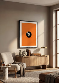 A shiny black eight-ball against an intense orange background with confident energy.-8