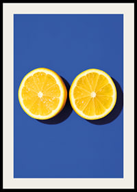 Two sunny yellow lemon halves shine against a deep blue background with fresh energy.-2