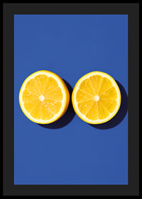 Two sunny yellow lemon halves shine against a deep blue background with fresh energy.-4
