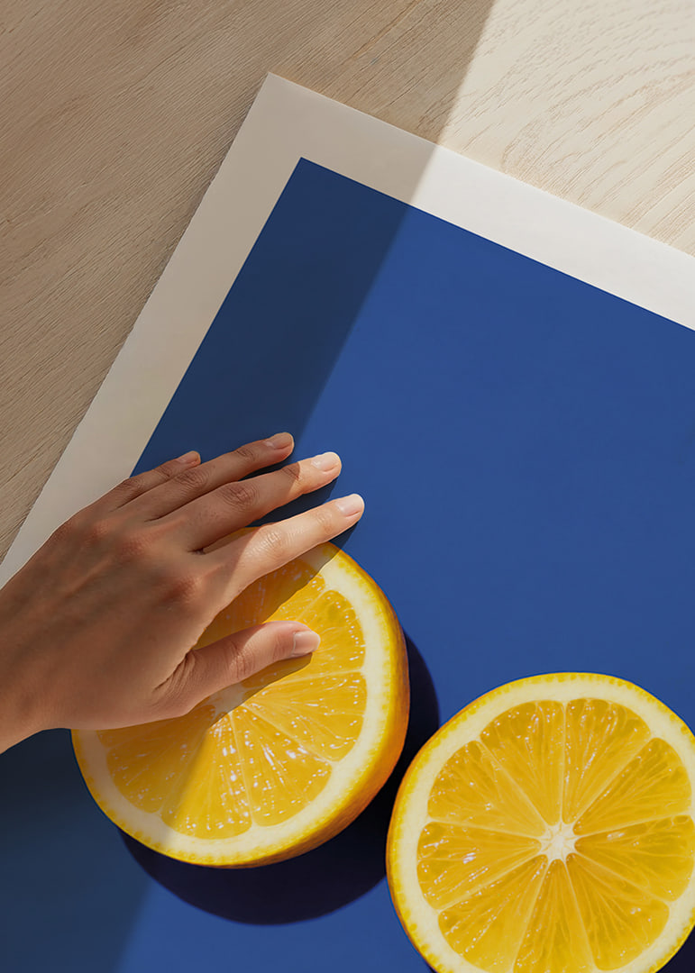 Two sunny yellow lemon halves shine against a deep blue background with fresh energy.-12