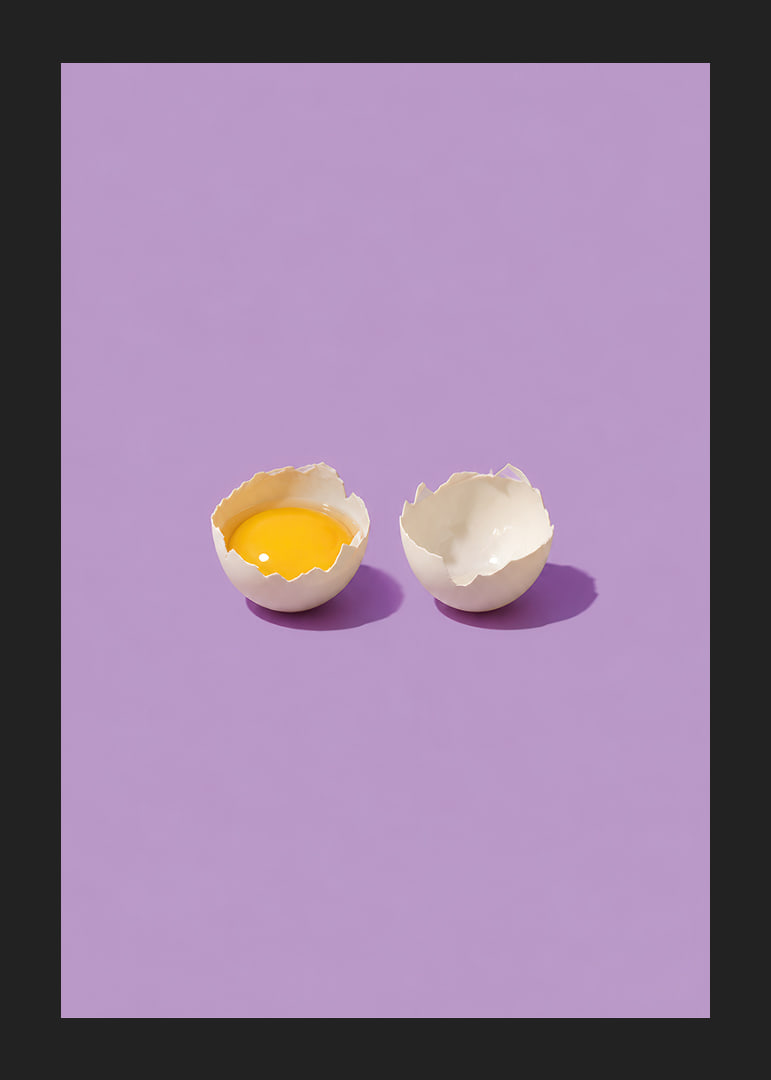 A golden egg in cracked shell against a purple background with a playful, stylish feel.-12