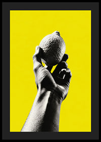 A hand lifts a lemon against an intensely yellow background with graphic energy.-4