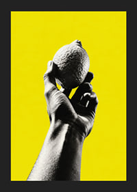 A hand lifts a lemon against an intensely yellow background with graphic energy.-5