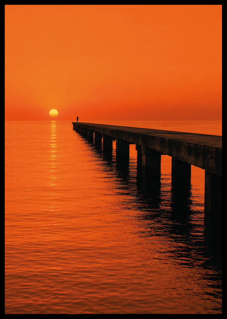 A lone person on a pier in a glowing orange sunset light.-12