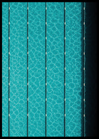 Turquoise pool water and dark track lines create a cool, graphic rhythm.-6