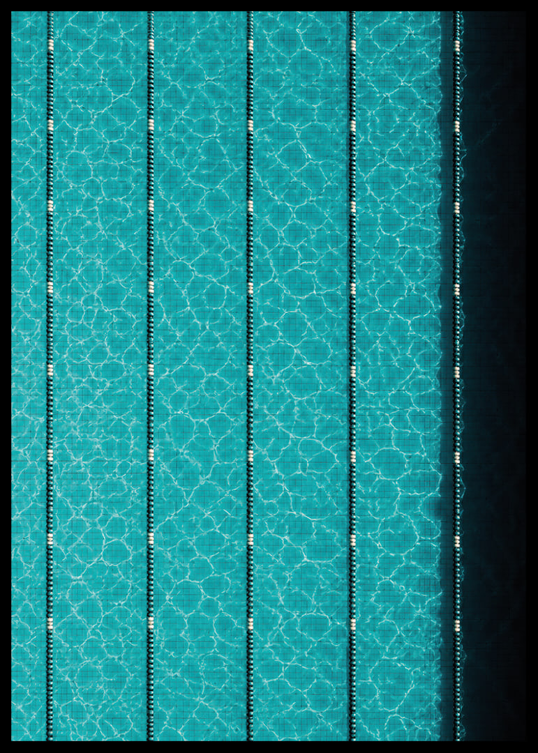 Turquoise pool water and dark track lines create a cool, graphic rhythm.-12
