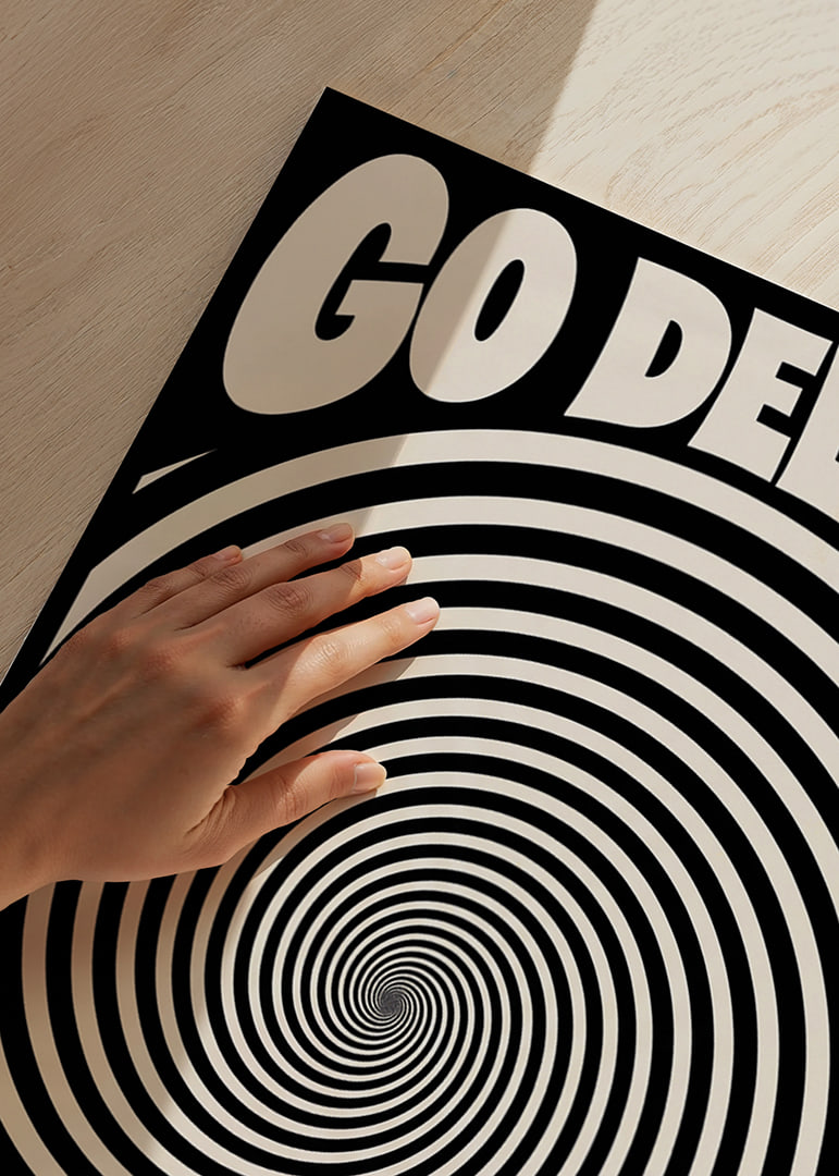 Graphic black and white spiral with the words GO DEEPER in a hypnotic and bold style.-12