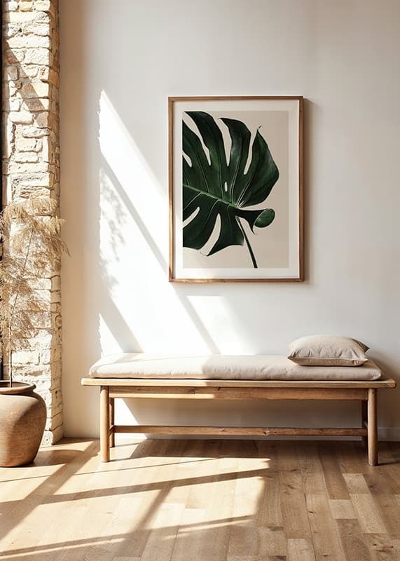 Photographic close-up of green monstera leaf against beige background-12