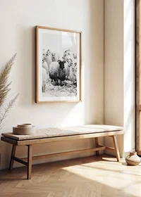 Photograph of black sheep among white sheep in snowy landscape-8