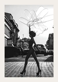 Black and white silhouette of woman with balloons in urban environment-3