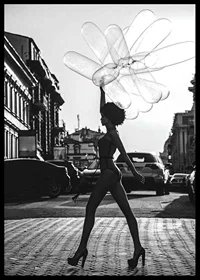 Black and white silhouette of woman with balloons in urban environment-6