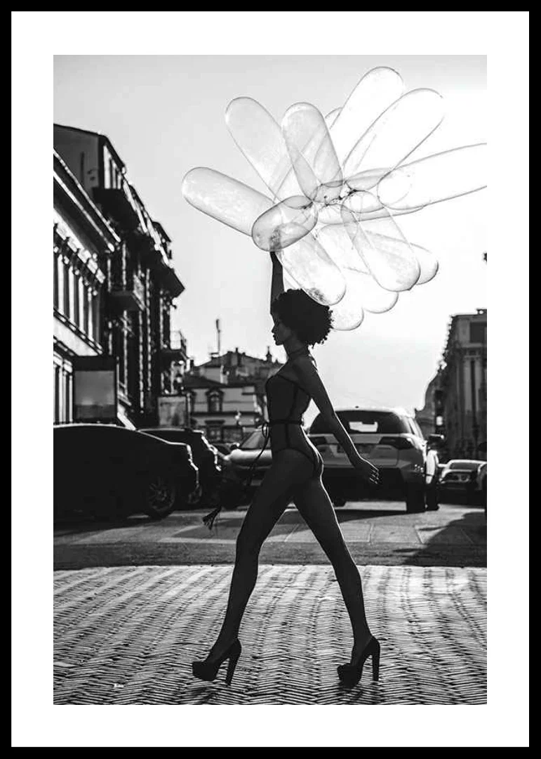 Black and white silhouette of woman with balloons in urban environment-12