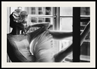 Black and white photograph of woman in lace dress by window-2