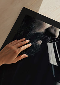 Close-up of man with beard smelling red wine in glass-9