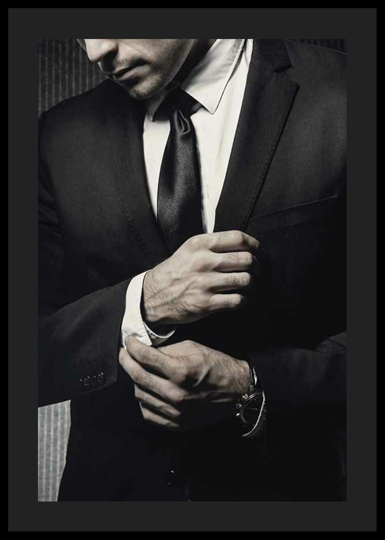 Close-up of man in black suit adjusting cufflinks-12