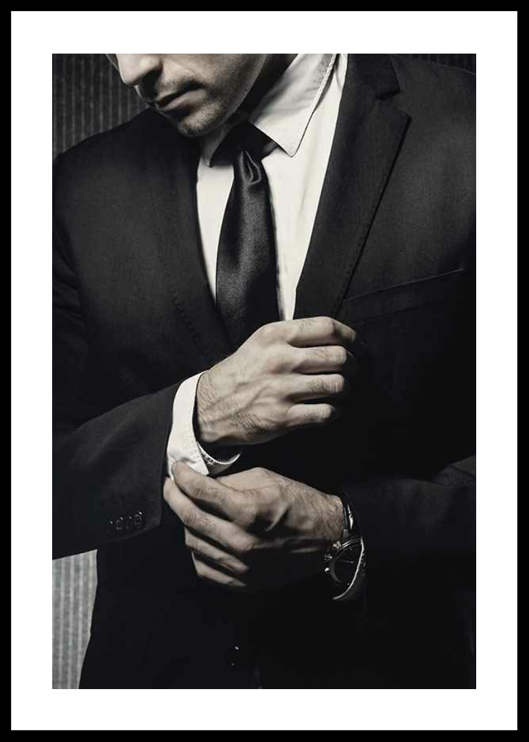 Close-up of man in black suit adjusting cufflinks-12