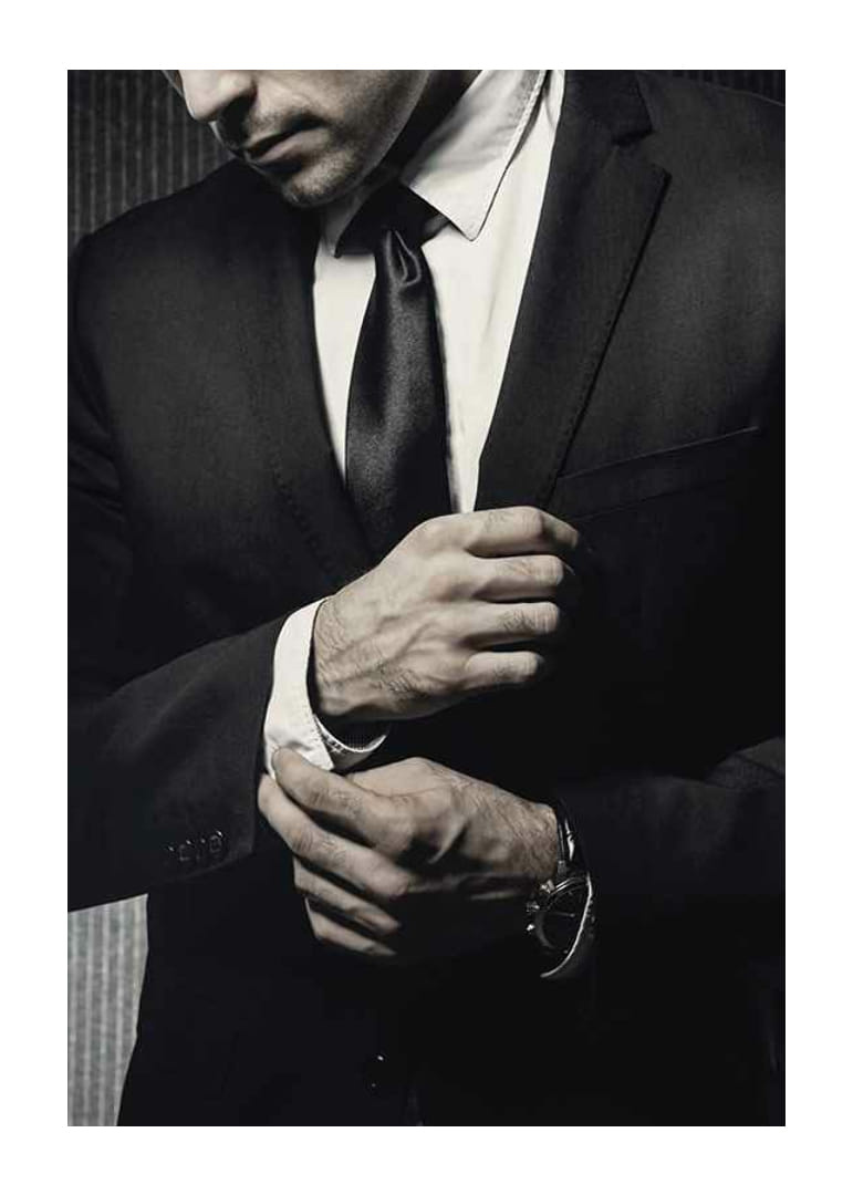 Close-up of man in black suit adjusting cufflinks-12