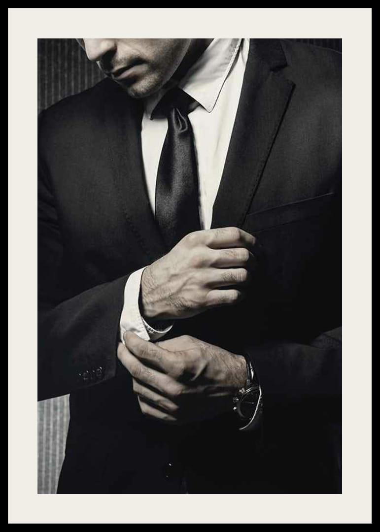 Close-up of man in black suit adjusting cufflinks-12